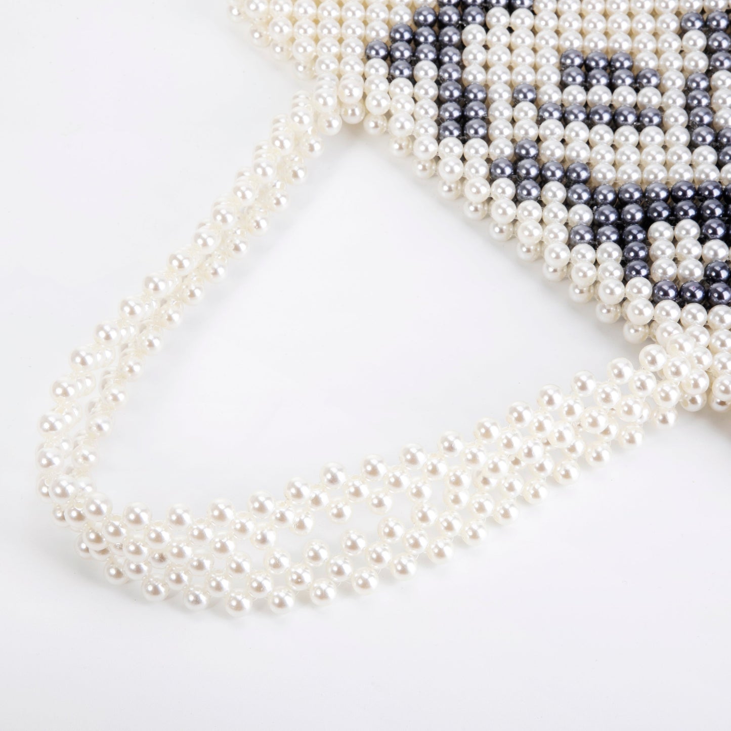 Lady Face Pearl Clutch