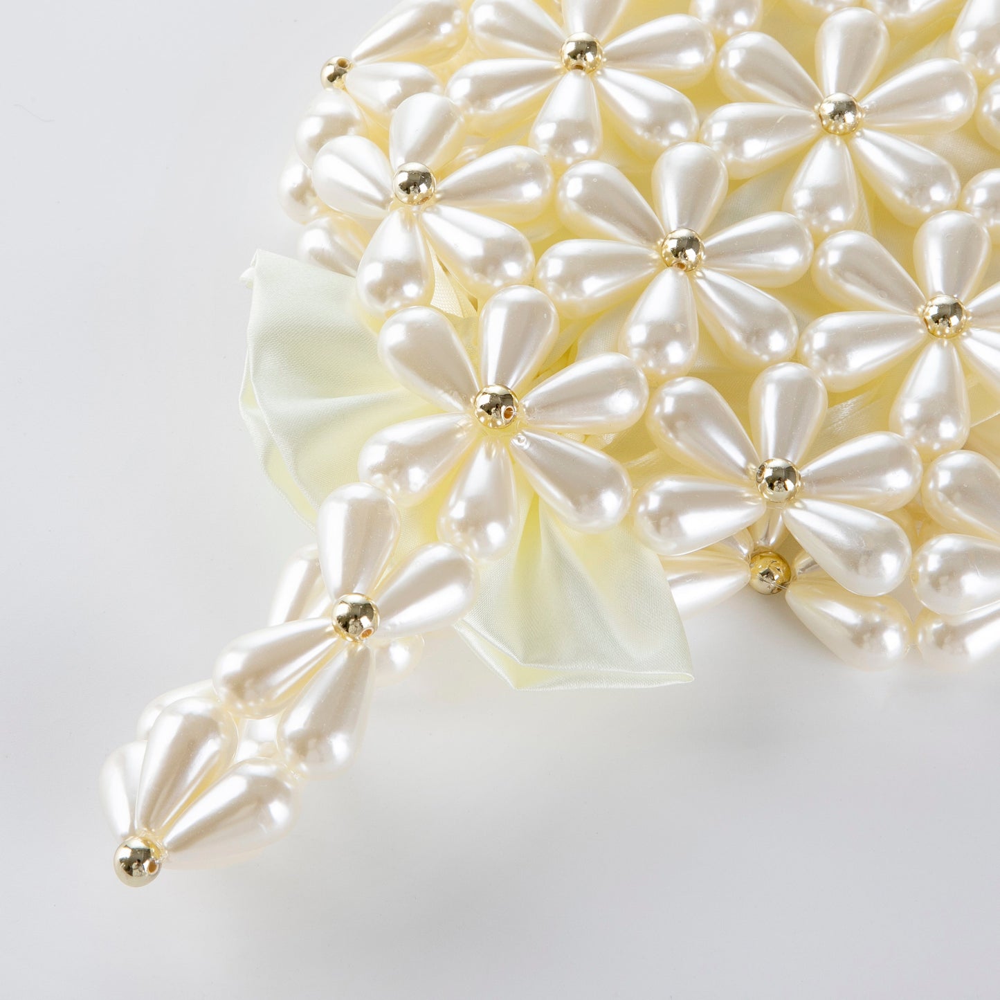 Hollow Snowflake Pearl Clutch