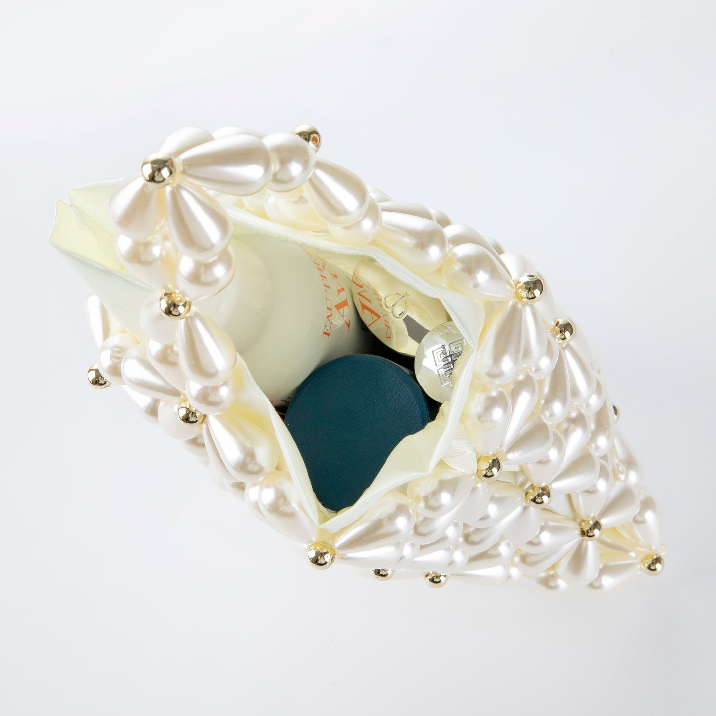 Hollow Snowflake Pearl Clutch