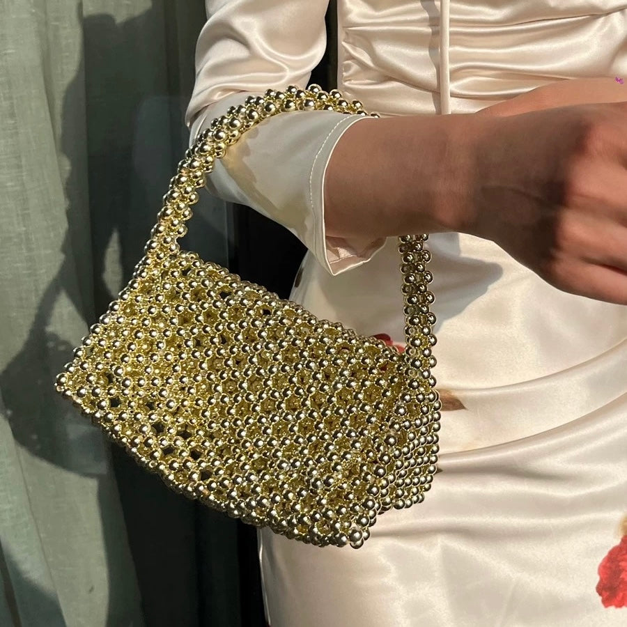 ゴールド トライアングル クラッチ