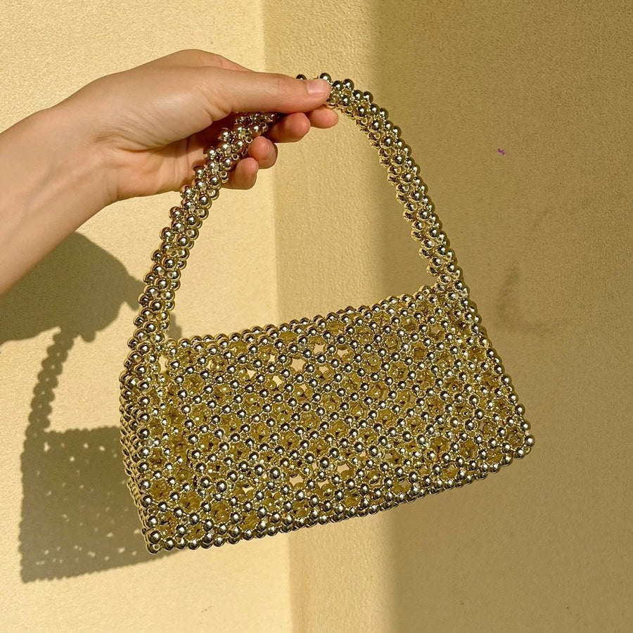 ゴールド トライアングル クラッチ